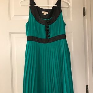 Green pleated empire waist dress